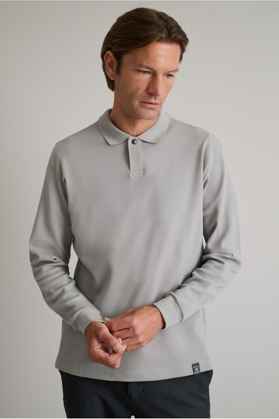 Jacquard μπλούζα polo με μακριά μανίκια και κρυφό κουμπί
