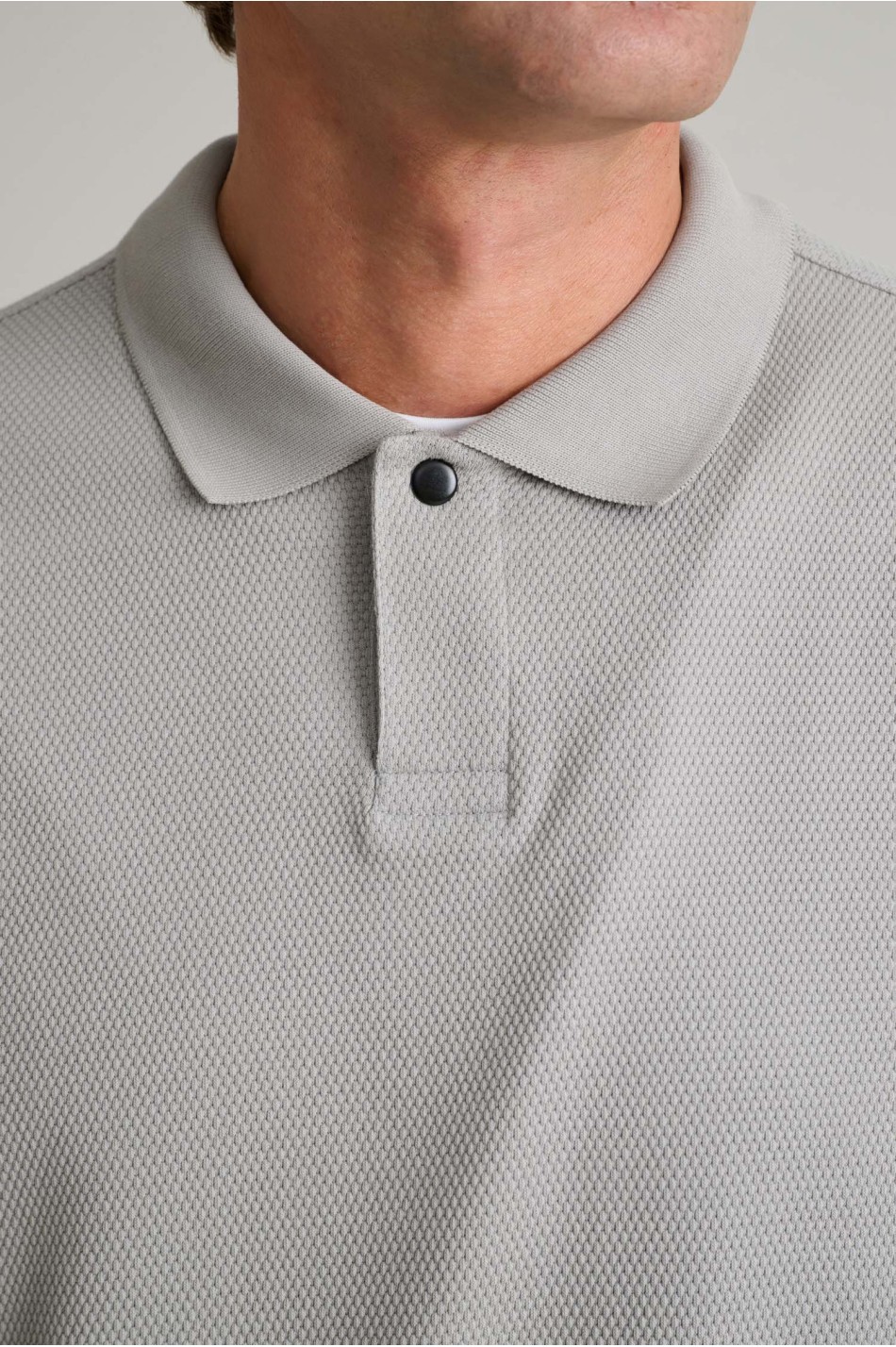 Jacquard μπλούζα polo με μακριά μανίκια και κρυφό κουμπί