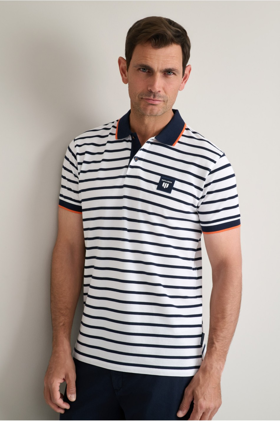 Striped cotton piqué polo shirt with detailing