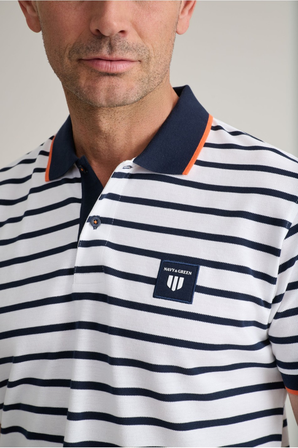 Striped cotton piqué polo shirt with detailing
